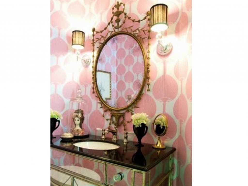 "This Bathroom Comes  To Life With This Fabulous Graphic Pink Wallpaper!! Elegant Light Fixture & Mirror, Provides Drama & An Opposing Element to The Wallpaper.