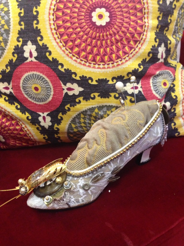 "Vintage Shoe Repurposed As Pin Cushion. Fabulous Idea! Love The Vintage Beatle Pin Detail, Perfect To Add To Your Collection. On Display At Frank Interiors"